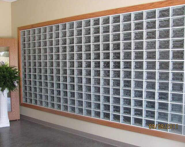 Wall of etched glass bricks honoring donors to the Lenox Community Center project